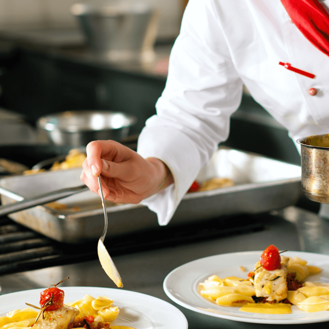 image of someone plating food