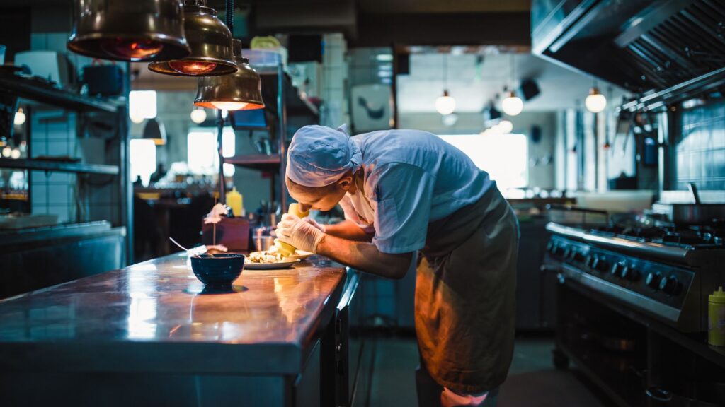 meticulous chef in kitchen